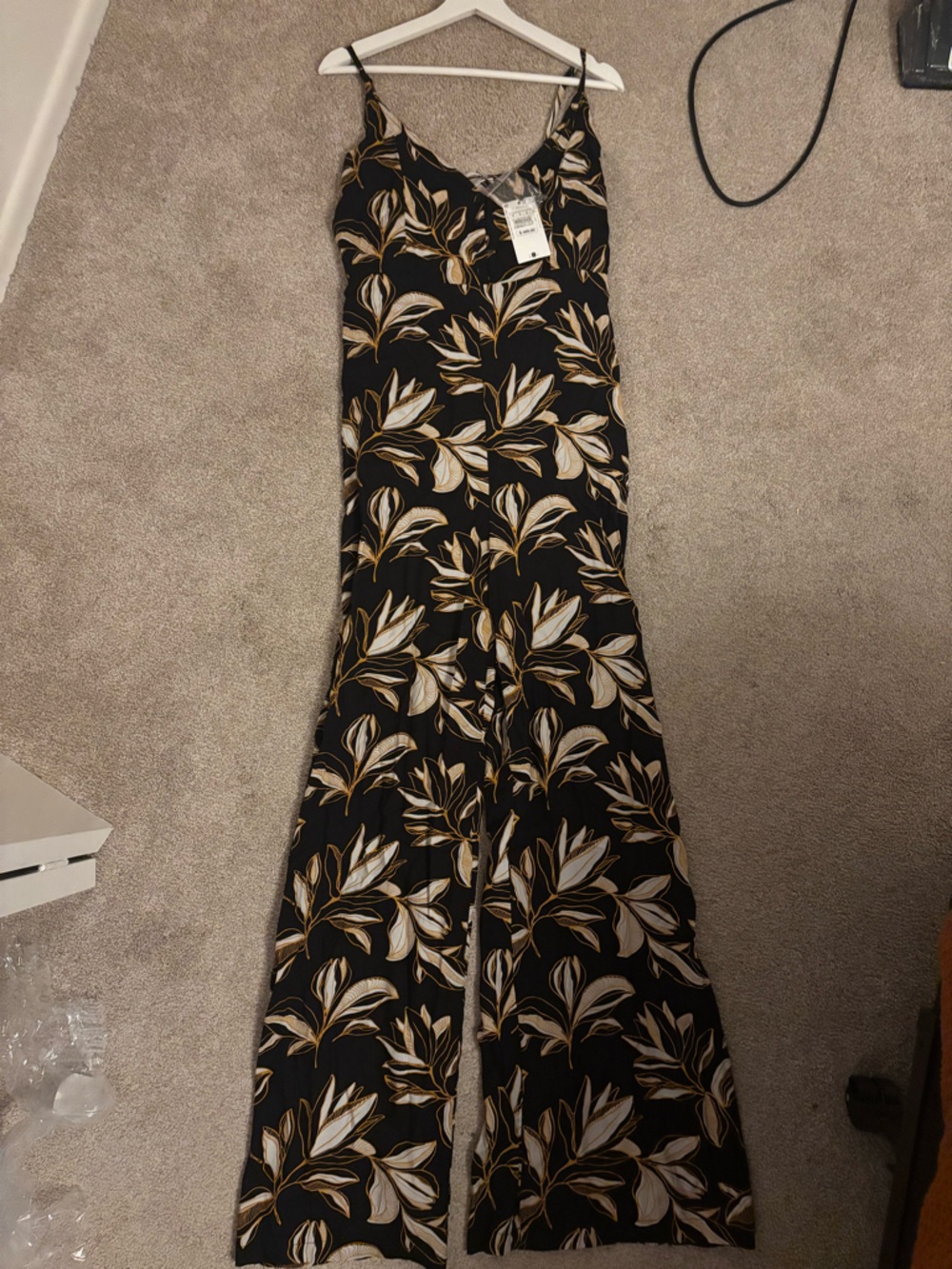 SFERA Black Wide-Leg Jumpsuit with Cream and Tan Leaf Print